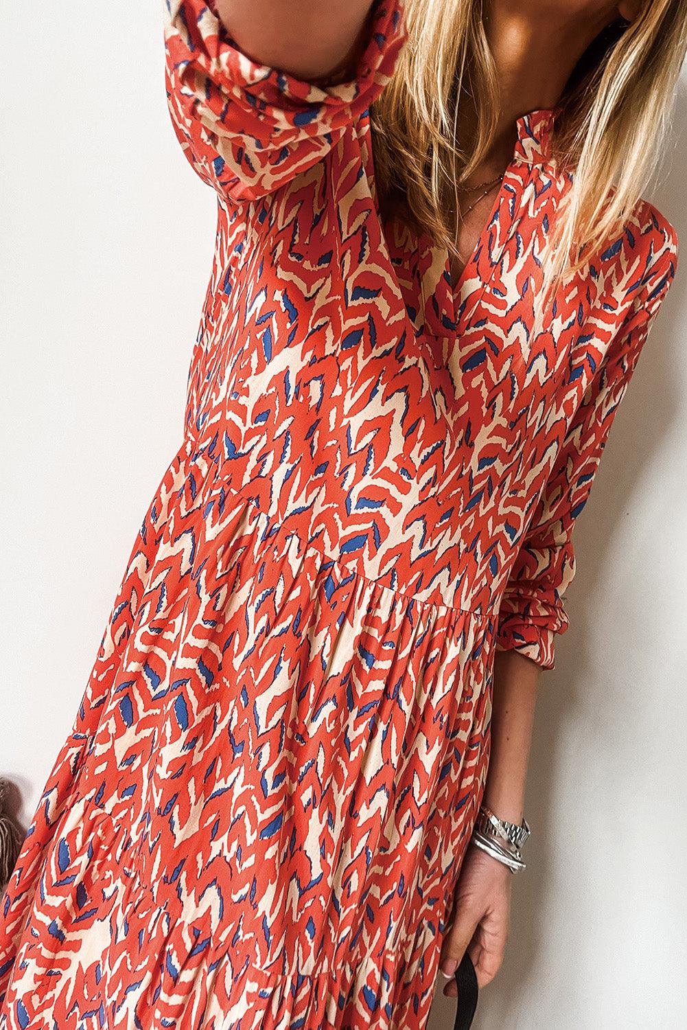 Leona™ | Geplooide Maxi Jurk met V - Hals en Abstracte Print - JURKJESWINKELTJE